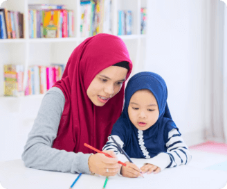 woman teaching the kid to write