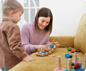 woman smiling while the boy is watching