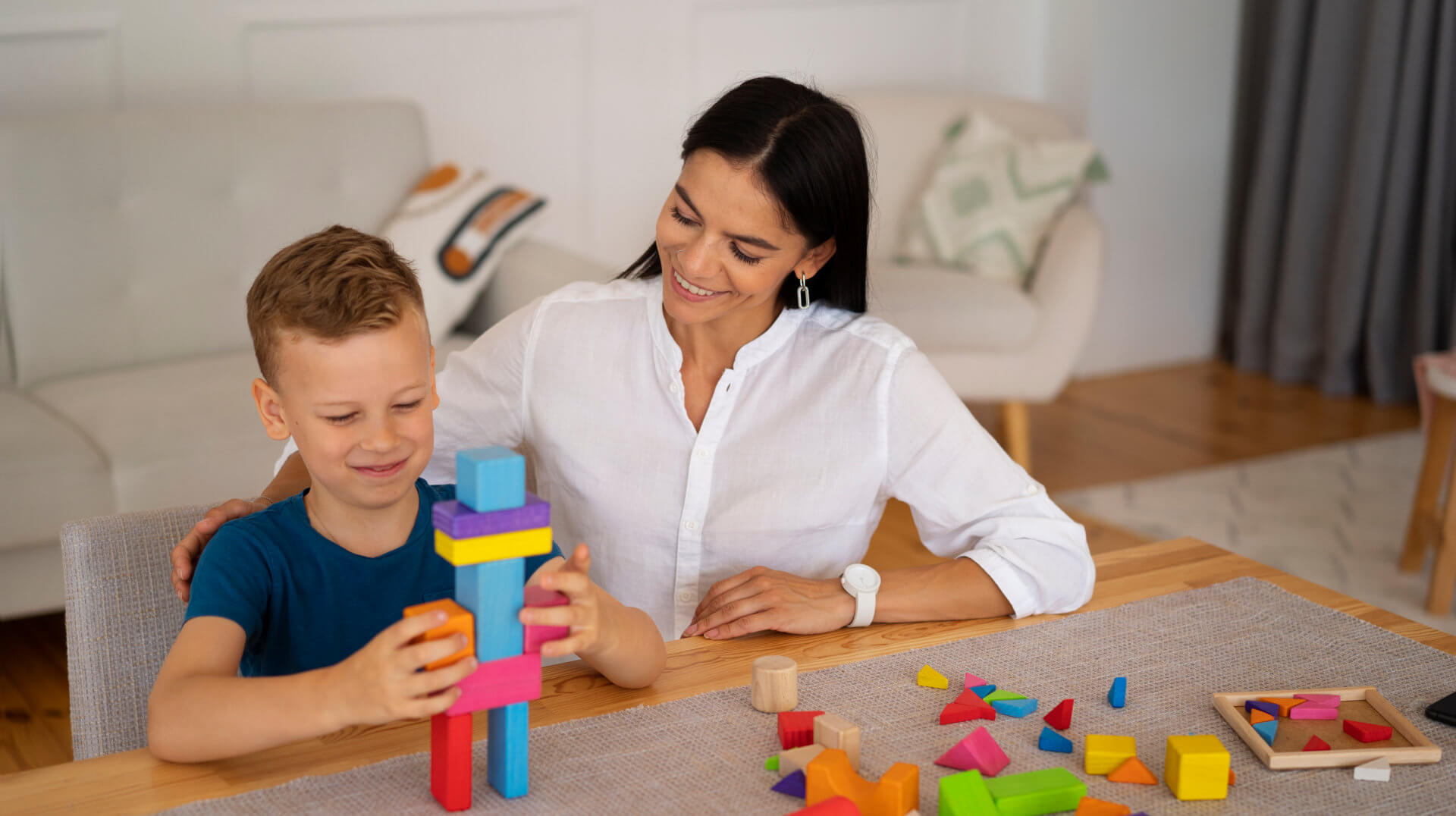 woman smiling at the boy