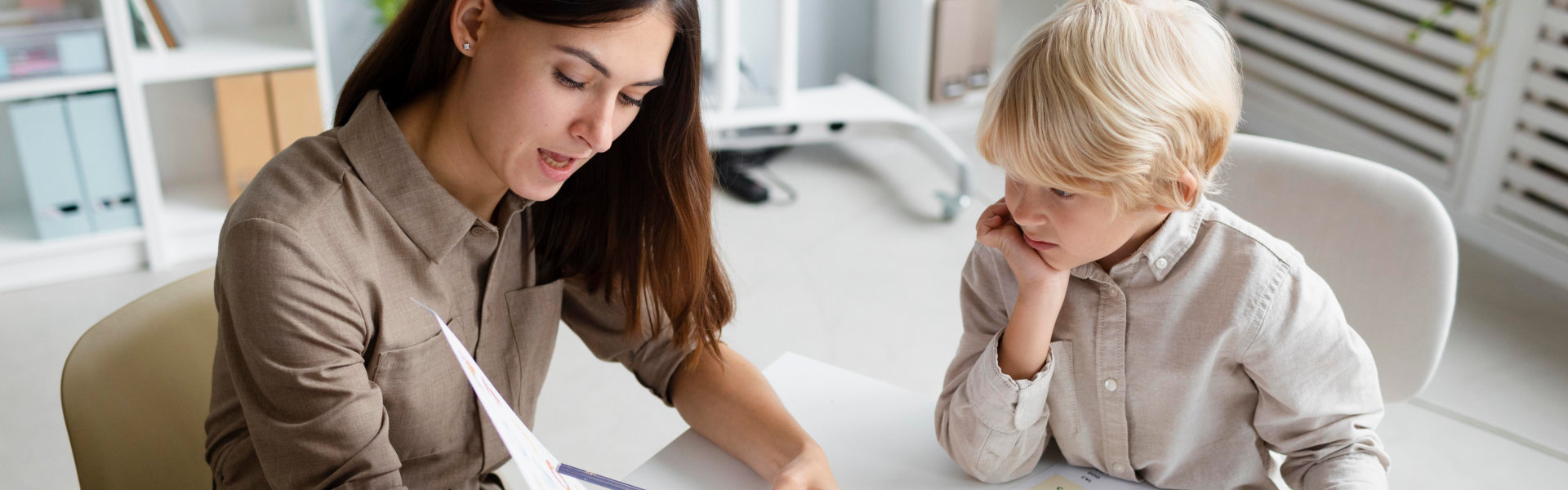kid listening to the woman