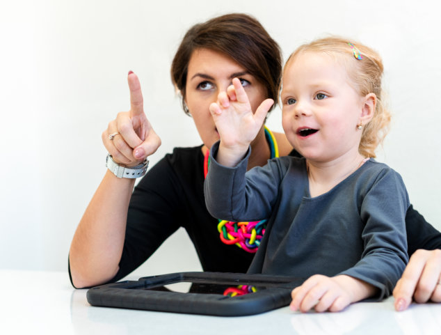 woman and kid pointing something