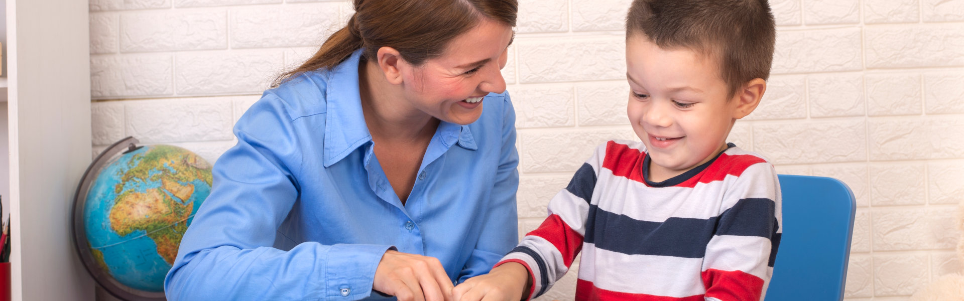 woman smiling at the kid